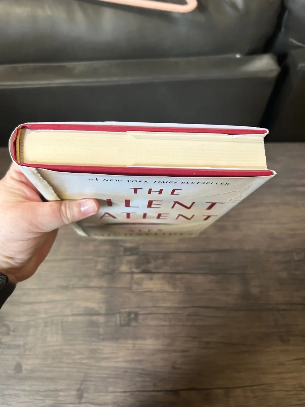 The Silent Patient by Alex Michaelides Hardcover Book - Cream with Red Text